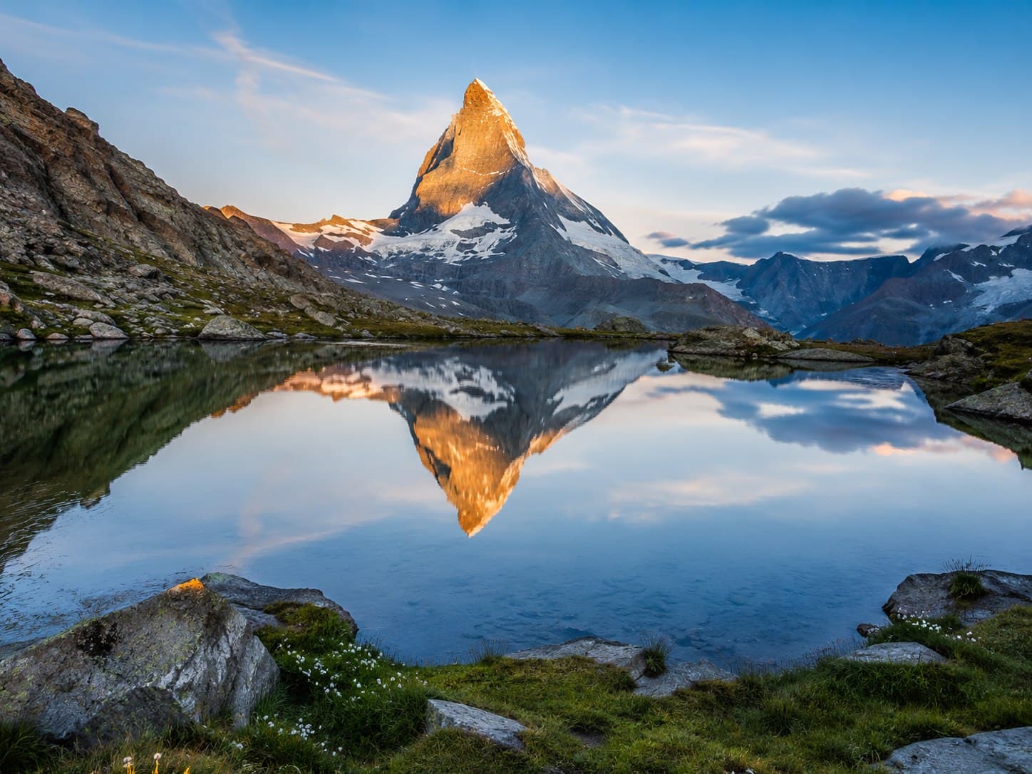 The Matterhorn at dawn reflected in an alpine lake near Zermatt, Switzerland
